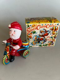 Vintage Santa Claus Cycle Tin Wind Up Toy