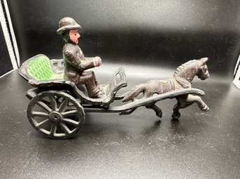 Cast Iron Horse And Carriage Toy With A Driver.