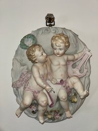 PORCELAIN BISQUE CHERUB WALL PLAQUE FIGURINE