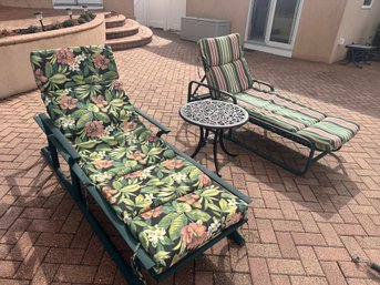 Two Chaise Loungers And Table With Reversible Cushions