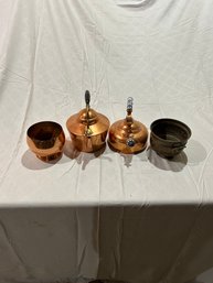 Two Teapots And Two Pots