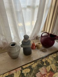 Lot 68- Decorative Vignette Featuring A Stacked Stone Sculpture, A Small Orange Pear Figurine, A Yellow Apple