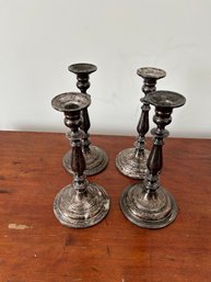 Lot 21-four Weighted Sterling Silver Candle Sticks