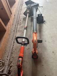 Lot 219- Black And Decker Battery Powered Weed Whacker And Leaf Blower