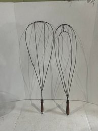 Lot 38- Pair Of Rug Beaters