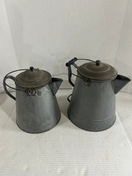 Lot 67-two Large Enamel Pitchers