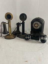 Lot 110-two Candle Stick Phones And A Rotary Phone.