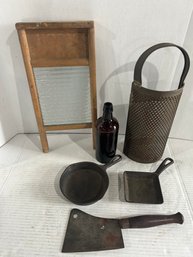 Lot 115-griswold 129 Square Eg Skillet, Cleaver, Large Grater Washboard And Bottle