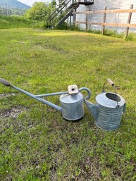Lot 210-two Watering Cans. One With Copper Spout.