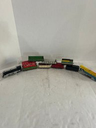 Lot 19- Hafner Windup Trains With 8 Pieces Of Track
