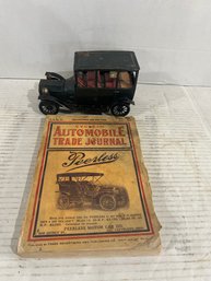 Lot 27- Cycle And Automobile Trade Journal -906 And Ford 1015 Toy Made In Japan