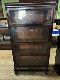 Lot 46- Lundstrom Classical Cherry Barrister Bookcase.