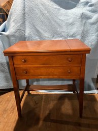 Lot 125- Vintage Sewing Machine Cabinet