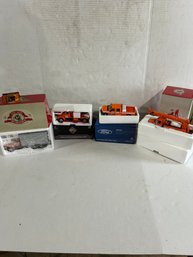 Lot 153- Lot Of Four CVPS Collector Trucks. With Boxes. New!