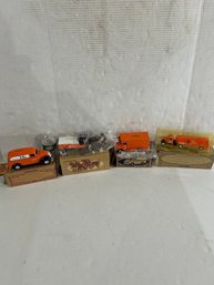 Lot 154- Four CVPS Collector Trucks