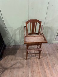Lot 173- Oak Childrens High Chair With Tray And Cane Seat