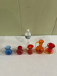 Lot 197- Five Mid-century Crackle Glass Pitchers.