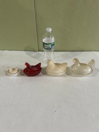 Lot 198- Four Small Nested Hens