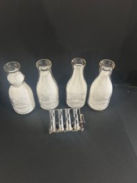 Lot 236- Four Milk Bottles: Rutland VT, Winooski VT, Waterbury VT, And A Coin Despenser