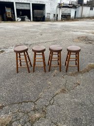 Lot 251- Set Of 4 Vintage Wooden Bar Stools With Faux Leather Cushioned Seats