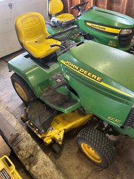 Lot 309- John Deere 345 Tractor With Rototiller Attachment.  Runs But Has Issues. See Description