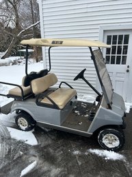 Lot 310- Gray Gas Powered Golf Cart. Runs As Should