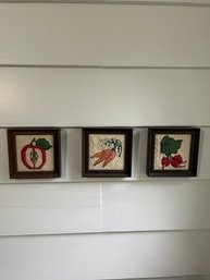 Lot 1- Three Vintage Cross-stitched Framed Wall Hanging Art Depicting Fruit And Vegetables. (1980s)