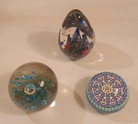 Three Hour Glass Paper Weights , Including A Fine Millifiore Paperweight