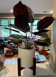 Faux Potted Plant On Wooden Stand