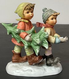 #6- Goebel Berta Hummel Tree Trimming Time