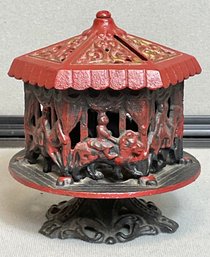 Vintage Cast Iron Spinning Carousel Coin Bank