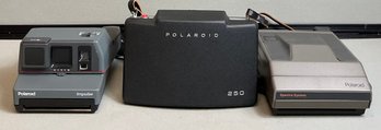 3 Vintage Polaroid Cameras
