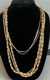 Four Gold Tone Necklaces
