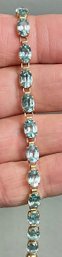14k Gold Sky Blue Topaz Tennis Bracelet