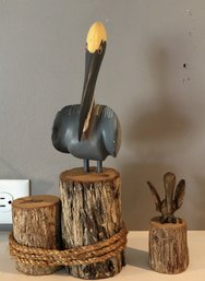 2 Carved Wood Pelicans