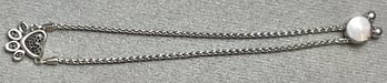 Sterling Adjustable Paw Print Bracelet