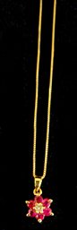14k Yellow Gold Ruby And Diamond Flower Necklace (2g)