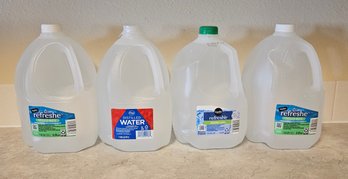 4- Gallon Jugs Of Water