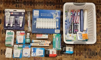 An Assortment Of Dental Items Incl. Dental Floss, Toothbrushes And More