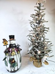 Snowman, Missing A Hand And Small Lighted Tree