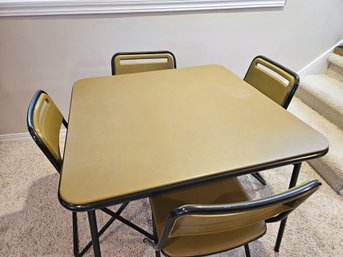 Vintage Cosco Table And Four Chairs - Nice Shape- One Chair Vinyl Is Pulling Away In Front