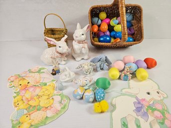 Two Easter Baskets, Eggs, Two Ceramic And Miscellaneous Cloth Bunnies