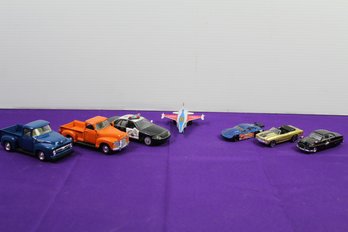 Six Toy Cars And Trucks, Plane