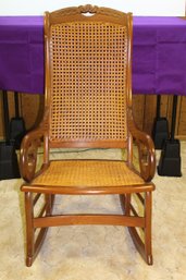 Nice Wood Wicker Rocker.