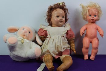 Two Dolls And A Lamb