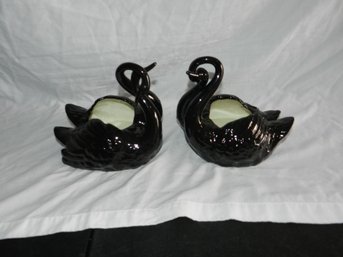 PAIR OF BLACK INTERTWINED SWAN PLANTERS