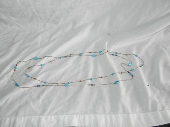 PAIR OF SILVER AND TURQUOISE NECKLACES