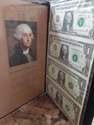 WORLD MONETARY EXCHANGE UNCUT SHEET $1 BILLS IN PORTFOILO