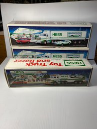 3 Hess Trucks With Race Cars