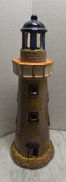 PORCELAIN LIGHT HOUSE CANDLE HOLDER